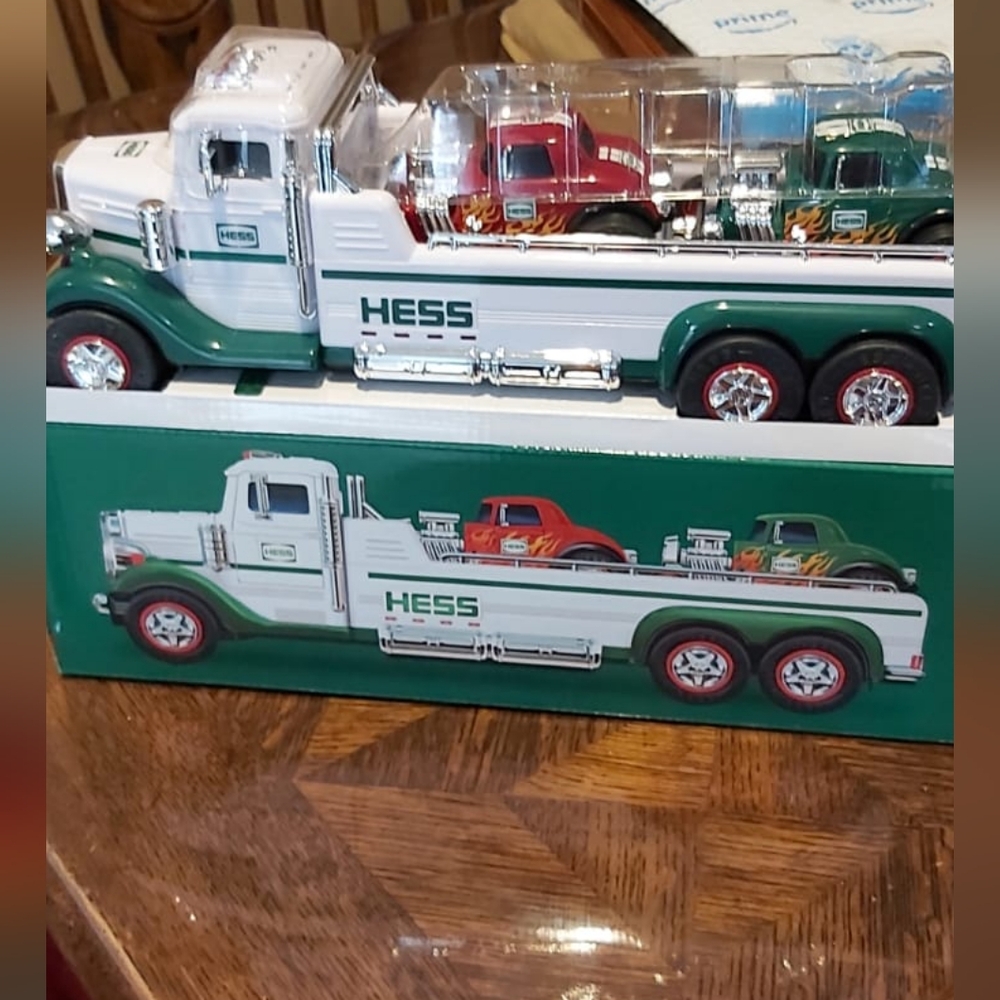 Toy troller truck with two cars